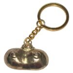 DIABLO PICANTE - GOLD METAL KEYCHAIN ​​WITH BREASTS