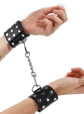 KINK - WRIST RESTRAINTS WITH SNAP FASTEN FULL OF RIVETS BLACK ADJUSTABLE 19-24 CM X 5.5 CM